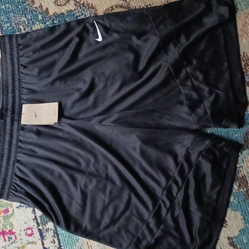 Nike BB loose fit, below knee shorts. XL. Black with white swoosh.